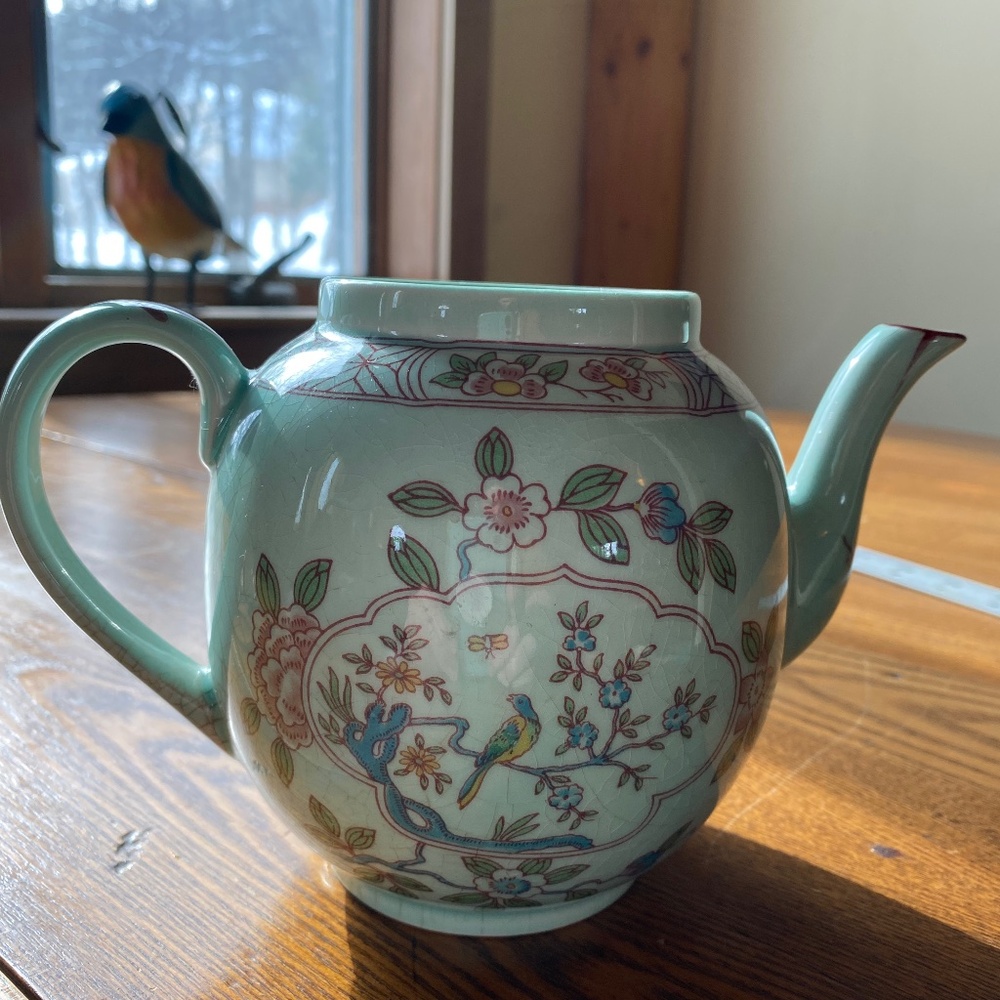 Adam’s Calyx Ware teapot Singapore bird